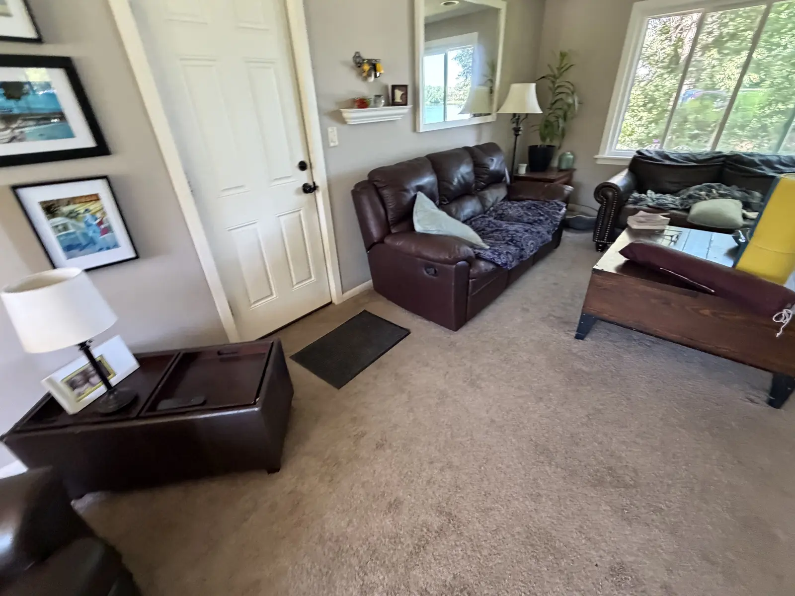 The living room before the carpet was removed.